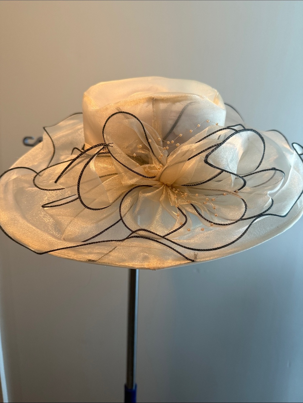Elegant Ivory Wide-Brim Ladies Hat with Decorative Bow
